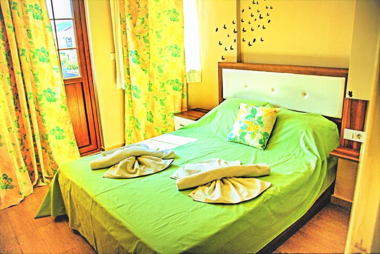 Paddys Apartments Ovacik โอลลุนเดนิซ ภายนอก รูปภาพ